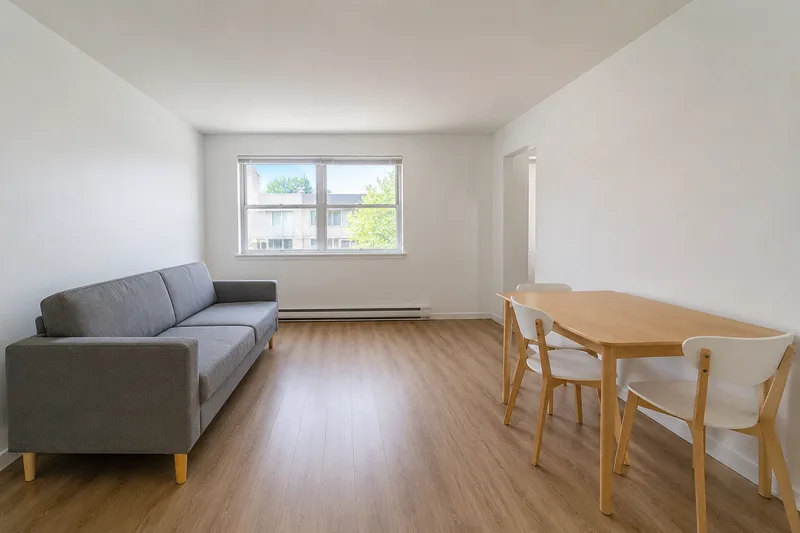 Plain rental apartment living room before an AI redesign