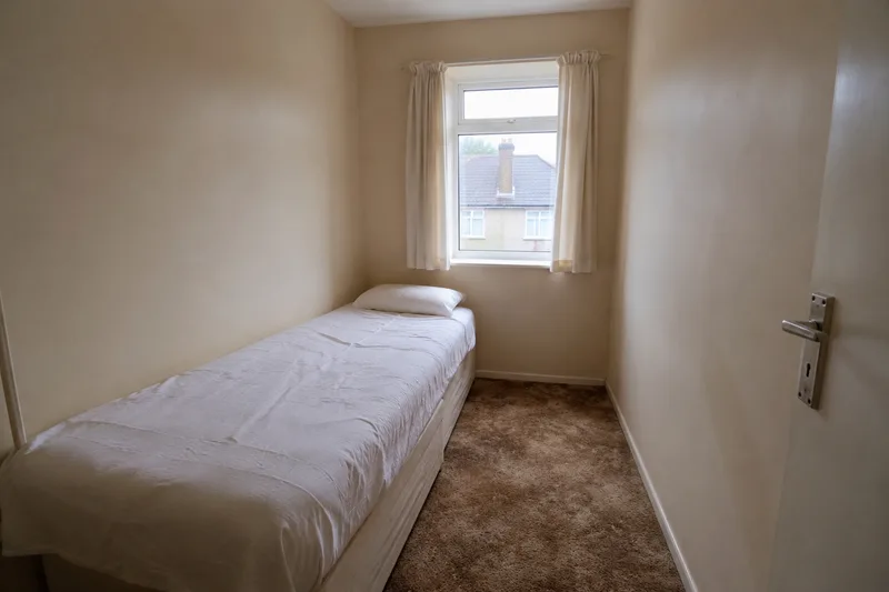 Cramped small bedroom before an AI redesign